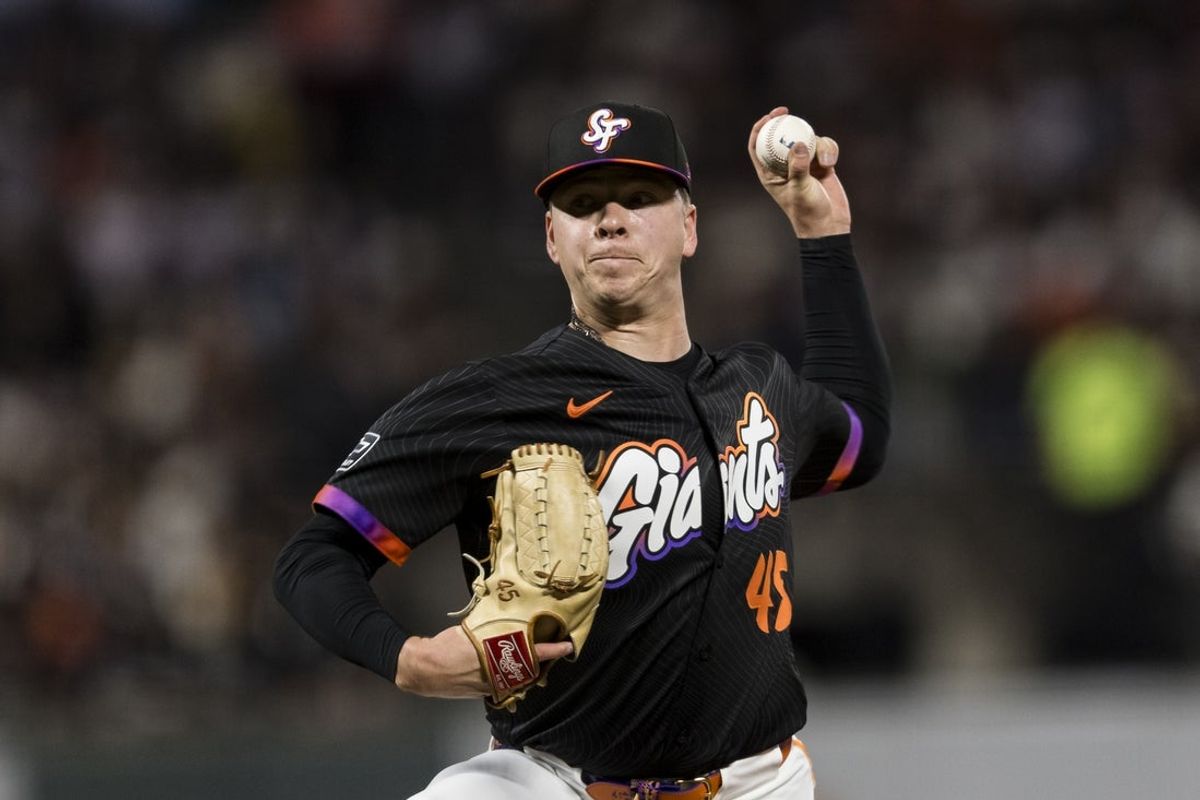 May 13, 2025; San Francisco, California, USA; San Francisco Giants relief pitcher Kyle Harrison (45) throws against the Arizona Diamondbacks during the seventh inning at Oracle Park. Mandatory Credit: John Hefti-Imagn Images