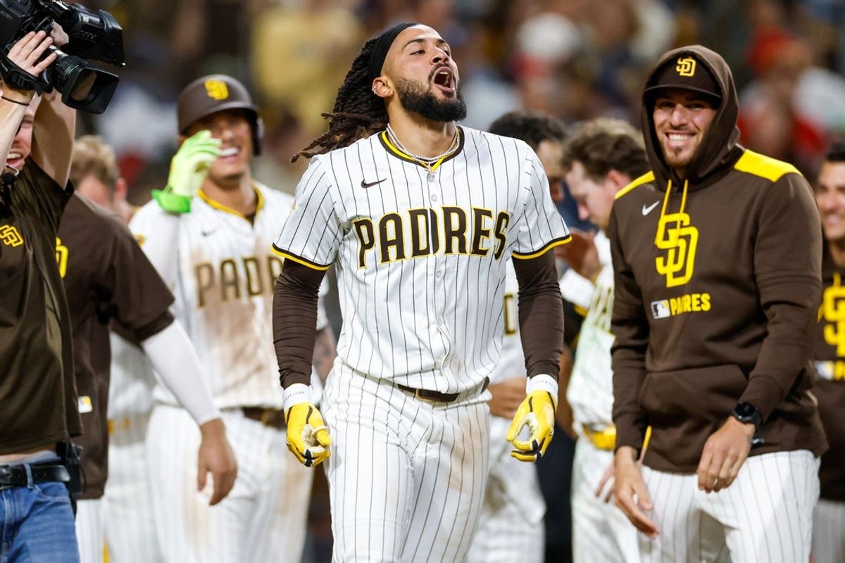 May 13, 2025; San Diego, California, USA; San Diego Padres right fielder Fernando Tatis Jr. (23) celebrates after hitting a walk-off two run home run during the ninth inning against the Los Angeles Angels at Petco Park. Mandatory Credit: David Frerker-Imagn Images