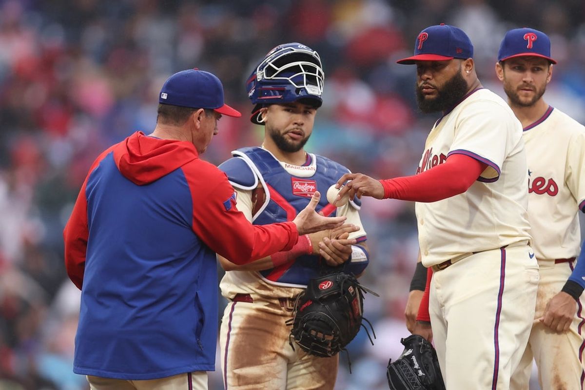 May 14, 2025; Philadelphia, Pennsylvania, USA; Philadelphia Phillies pitcher José Alvarado (46) is relieved by manager Rob Thomson during the eighth inning against the St. Louis Cardinals at Citizens Bank Park. Mandatory Credit: Bill Streicher-Imagn Images