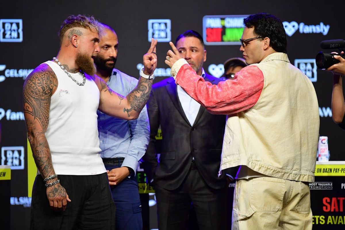 May 14, 2025; Los Angeles, California, USA; Jake Paul and Julio Cesar Chavez Jr. pose for photos in anticipation of their fight at Avalon Hollywood Theater. Mandatory Credit: Gary A. Vasquez-Imagn Images