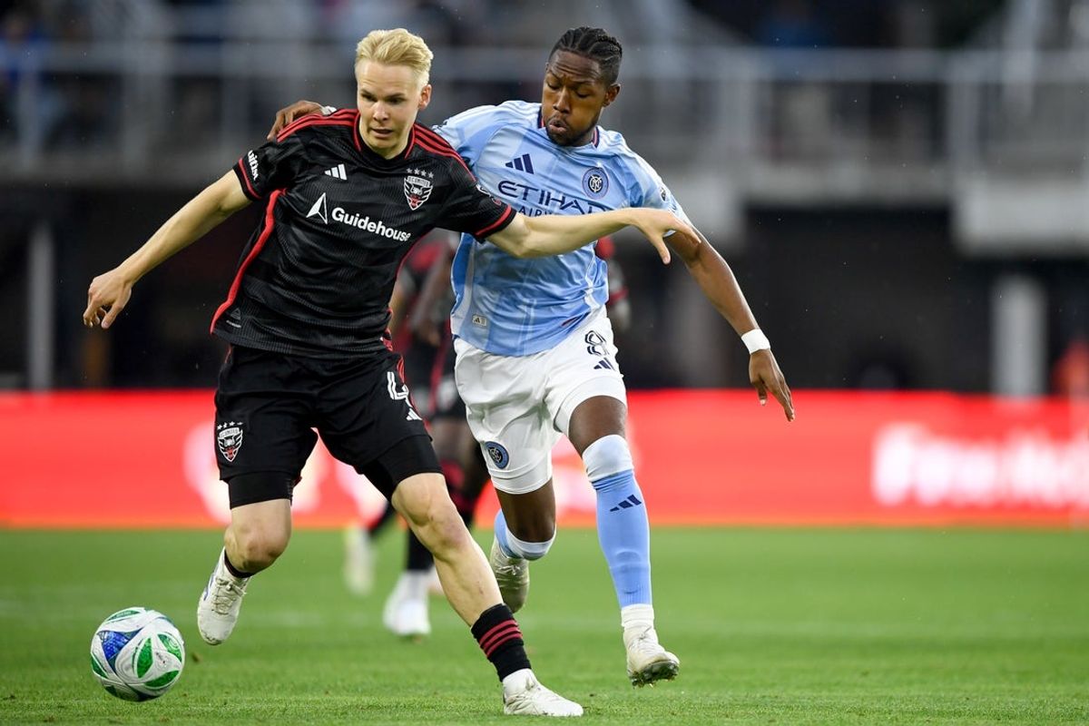May 14, 2025; Washington, District of Columbia, USA; D.C. United midfielder Matti Peltola (4) controls the ball against New York City FC midfielder Andrés Perea (8) during the first half of the game at Audi Field. Mandatory Credit: Hannah Foslien-Imagn Images