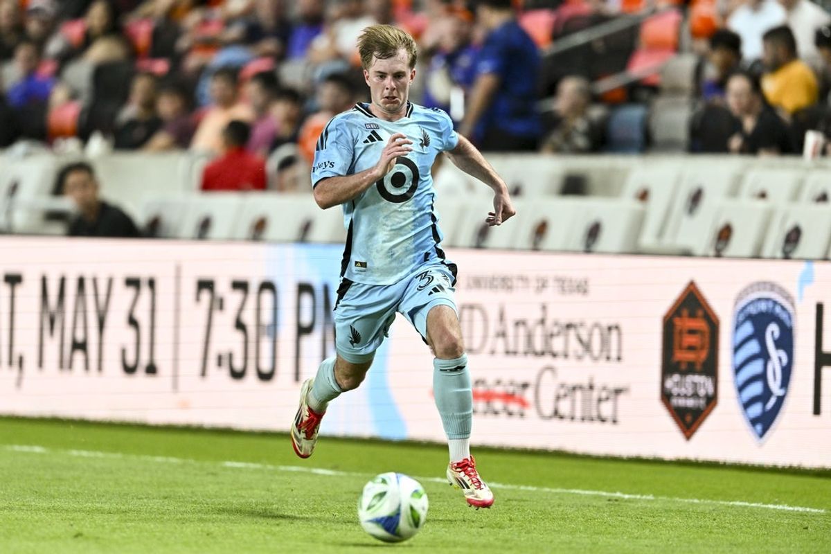 May 14, 2025; Houston, Texas, USA; Minnesota United FC forward Kieran Chandler dribbles the ball during the first half against the Houston Dynamo FC at Shell Energy Stadium. Mandatory Credit: Maria Lysaker-Imagn Images