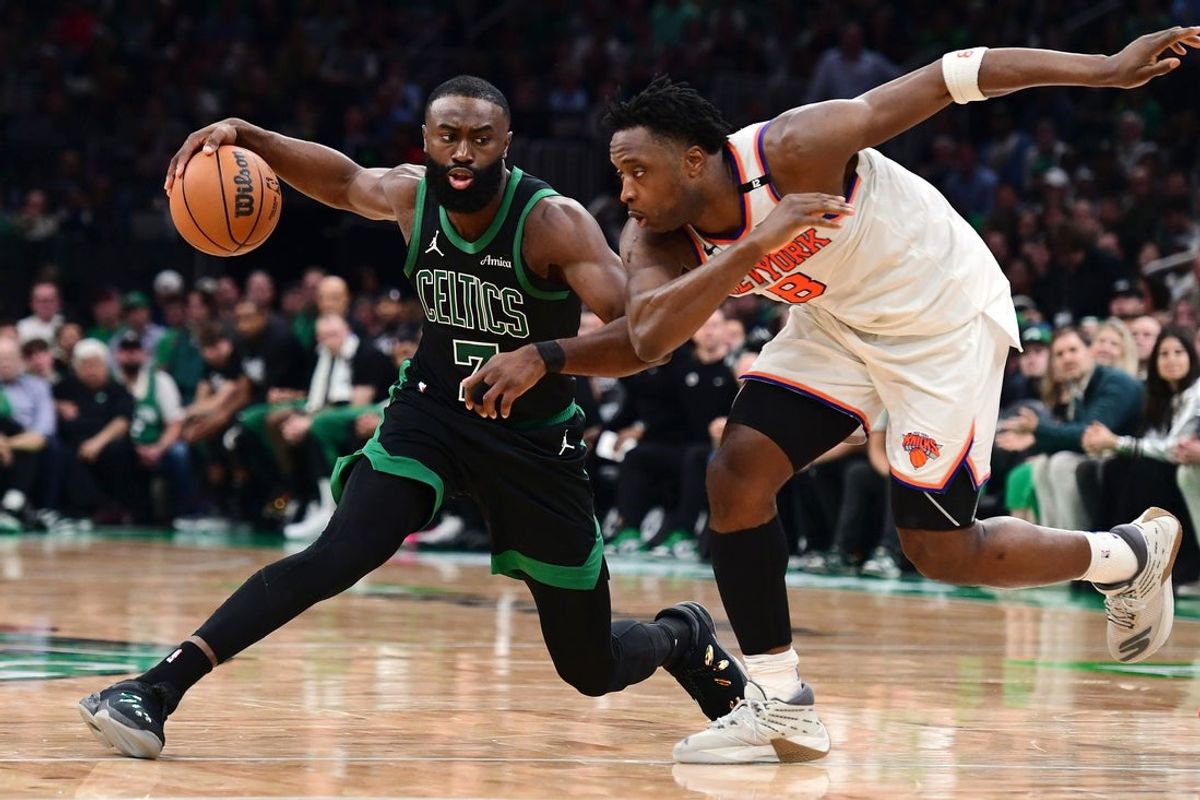 May 14, 2025; Boston, Massachusetts, USA; Boston Celtics guard Jaylen Brown (7) controls the ball from New York Knicks forward OG Anunoby (8) in the second half during game five of the second round for the 2025 NBA Playoffs at TD Garden. Mandatory Credit: Bob DeChiara-Imagn Images