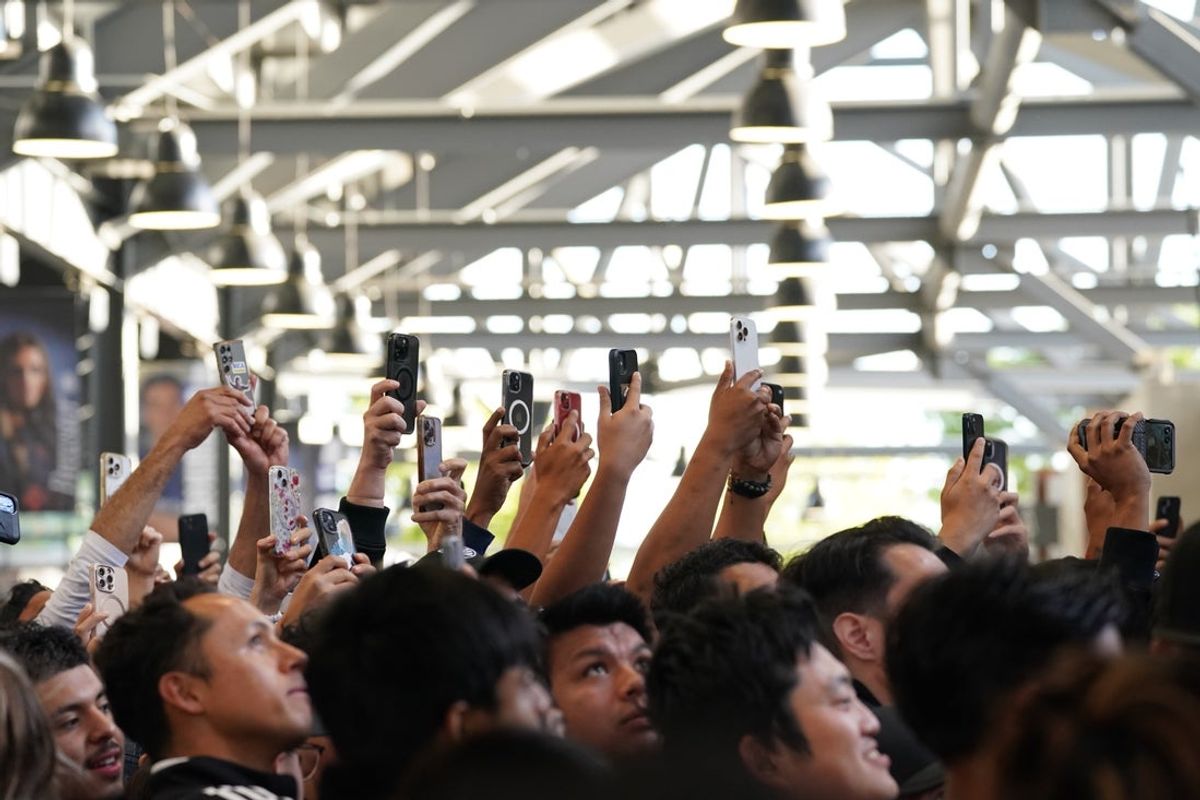 May 14, 2025; San Jose, California, USA; Fans hold up their mobile phone as they await the appearance of Lionel Messi  before the San Jose Earthquakes vs. Inter Miami FC match at PayPal Park. Mandatory Credit: David Gonzales-Imagn Images