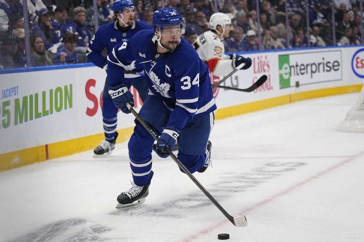 May 14, 2025; Toronto, Ontario, CAN; Toronto Maple Leafs forward Auston Matthews (34) carries the puck against the Florida Panthers during the second period of game five of the second round of the 2025 Stanley Cup Playoffs at Scotiabank Arena. Mandatory Credit: John E. Sokolowski-Imagn Images