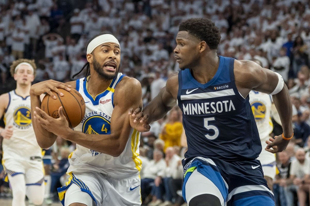 May 14, 2025; Minneapolis, Minnesota, USA; Golden State Warriors guard Moses Moody (4) drives to the basket past Minnesota Timberwolves guard Anthony Edwards (5) in the second half during game five of the second round for the 2025 NBA Playoffs at Target Center. Mandatory Credit: Jesse Johnson-Imagn Images