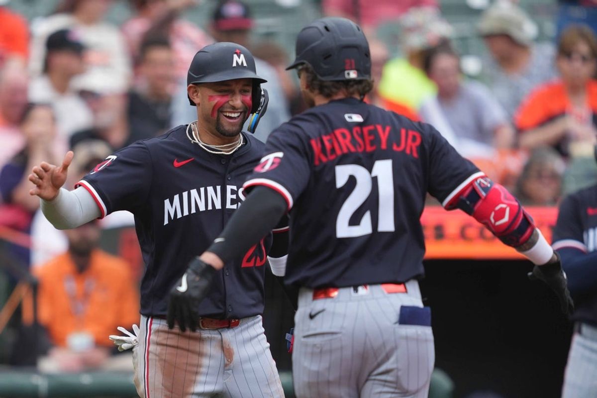 May 15, 2025; Baltimore, Maryland, USA; Minnesota Twins outfielder Dashawn Keirsey (21) greeted by third baseman Royce Lewis (23) following his two run home run during the third inning against the Baltimore Orioles at Oriole Park at Camden Yards. Mandatory Credit: Mitch Stringer-Imagn Images