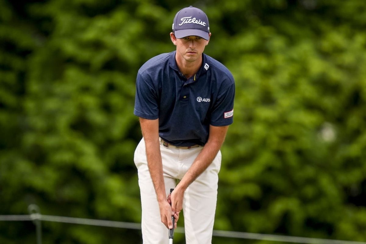 May 16, 2025; Charlotte, North Carolina, USA; Elvis Smylie lines up a shot on the fifth hole green during the second round of the PGA Championship golf tournament at Quail Hollow. Mandatory Credit: Jim Dedmon-Imagn Images