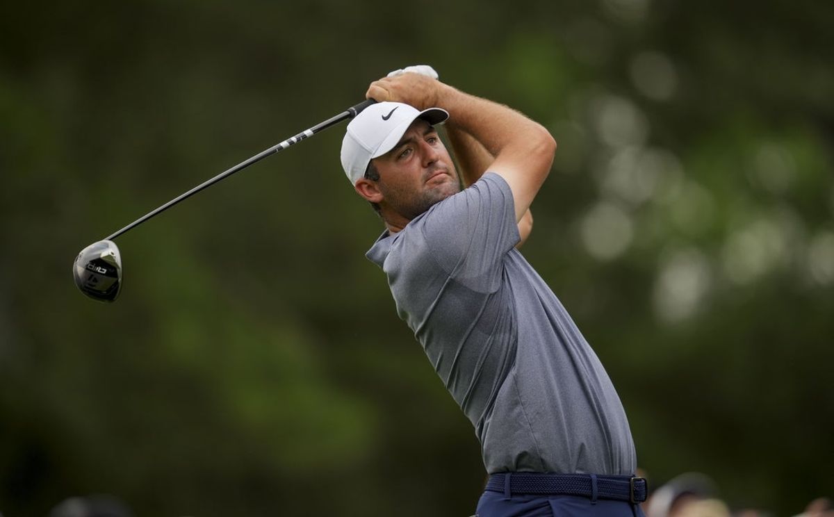 May 16, 2025; Charlotte, North Carolina, USA; Scottie Scheffler tees off at the third hole during the second round of the PGA Championship golf tournament at Quail Hollow. Mandatory Credit: Aaron Doster-Imagn Images
