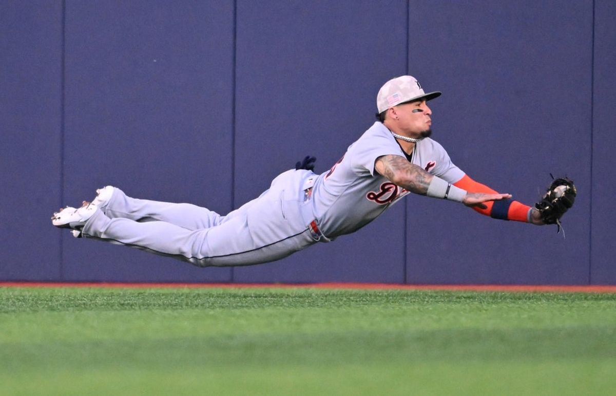 May 16, 2025; Toronto, Ontario, CAN; Detroit Tigers center fielder Javier Baez (28) catches a fly ball hit by Toronto Blue Jays right fielder Nathan Lukes (not pictured) in the second inning at Rogers Centre. Mandatory Credit: Dan Hamilton-Imagn Images