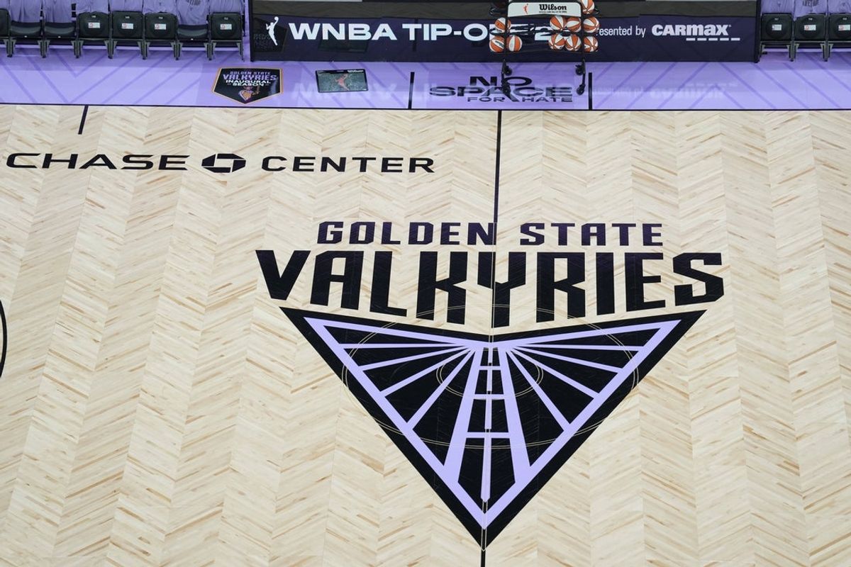 May 16, 2025; San Francisco, California, USA; A few of the Golden State Valkyries logo at center court before the game against the Los Angeles Sparks at Chase Center. Mandatory Credit: Darren Yamashita-Imagn Images