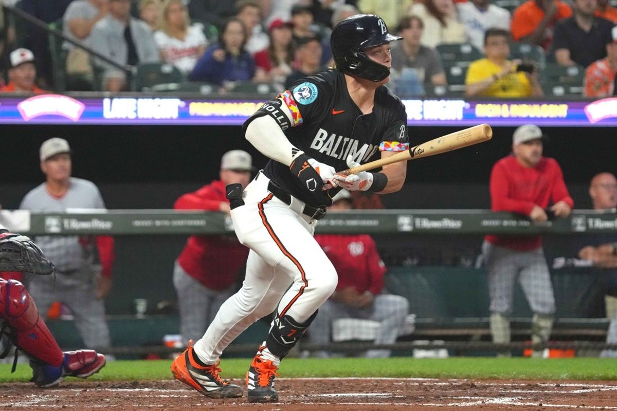 May 16, 2025; Baltimore, Maryland, USA; Baltimore Orioles second baseman Jackson Holliday (7) drives in a run with his single during the third inning against the Washington Nationals at Oriole Park at Camden Yards. Mandatory Credit: Mitch Stringer-Imagn Images