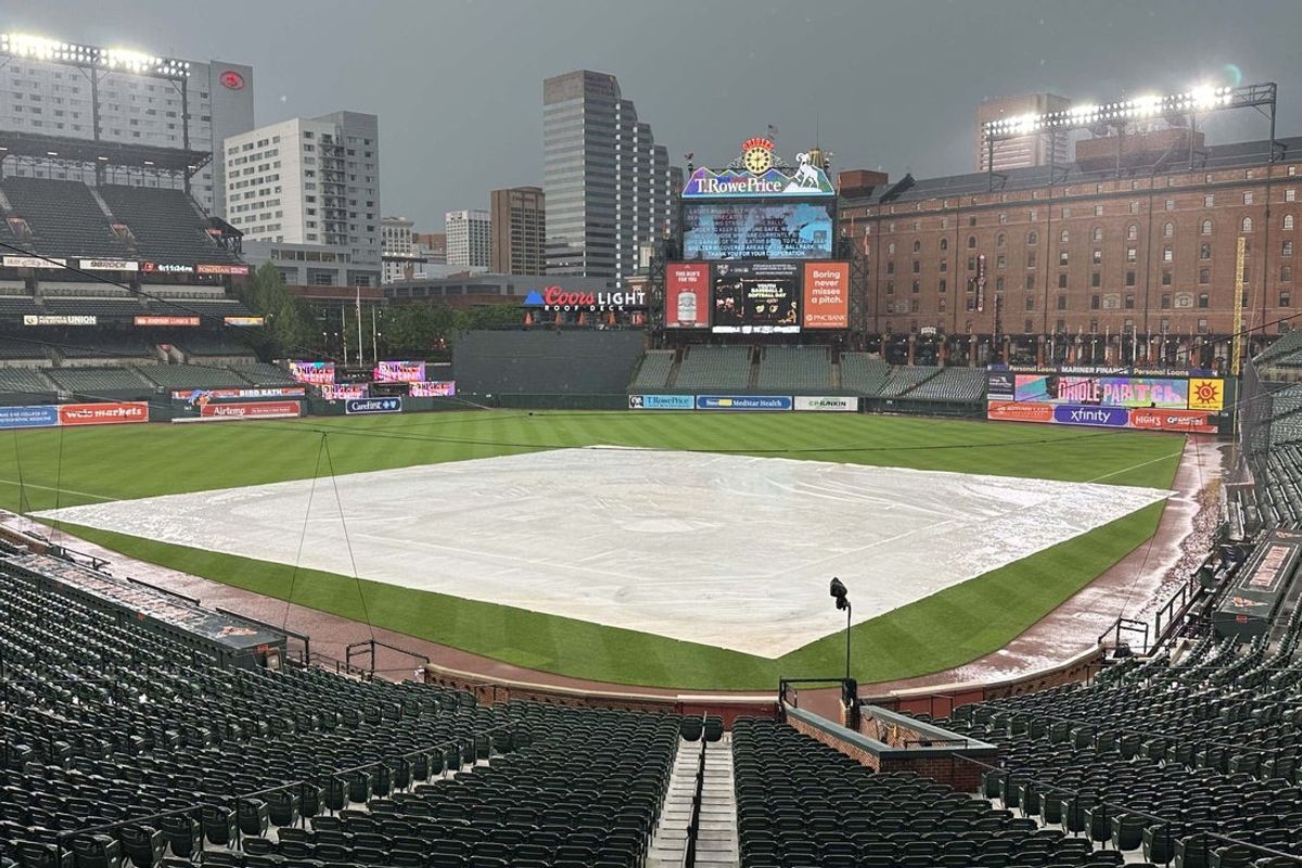 May 16, 2025; Baltimore, Maryland, USA; Rain delay prior to the Baltimore Orioles game against the Washington Nationals at Oriole Park at Camden Yards. Mandatory Credit: Mitch Stringer-Imagn Images
