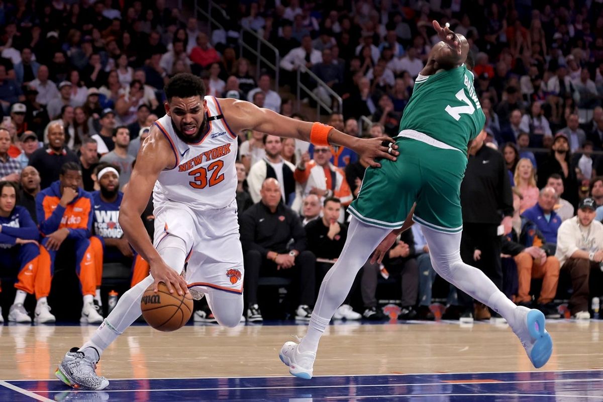 May 16, 2025; New York, New York, USA; New York Knicks center Karl-Anthony Towns (32) drives to the basket against Boston Celtics guard Jaylen Brown (7) during the first quarter of game six in the second round of the 2025 NBA Playoffs at Madison Square Garden. Mandatory Credit: Brad Penner-Imagn Images