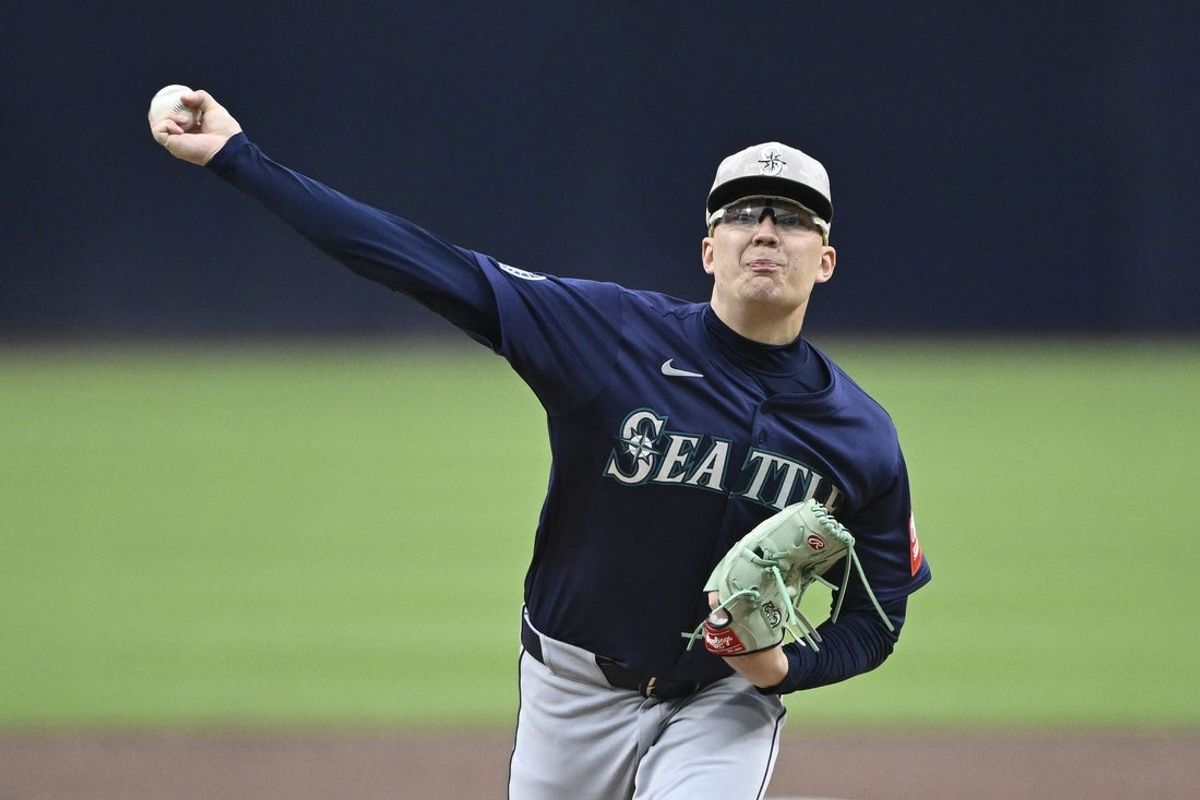 May 16, 2025; San Diego, California, USA; Seattle Mariners starting pitcher Logan Evans (73) delivers during first inning against the San Diego Padres at Petco Park. Mandatory Credit: Denis Poroy-Imagn Images