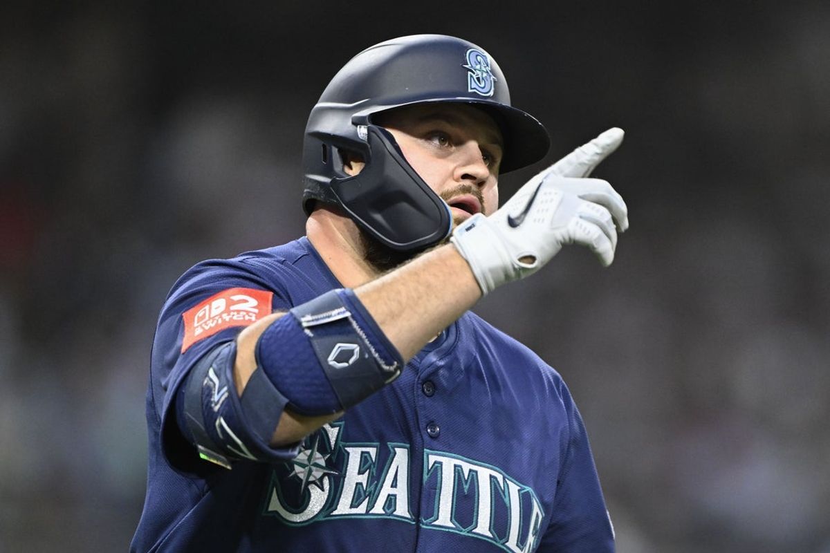 May 16, 2025; San Diego, California, USA; Seattle Mariners first baseman Rowdy Tellez (23) rounds the bases after hitting a two-run home run during fourth inning against the San Diego Padres at Petco Park. Mandatory Credit: Denis Poroy-Imagn Images