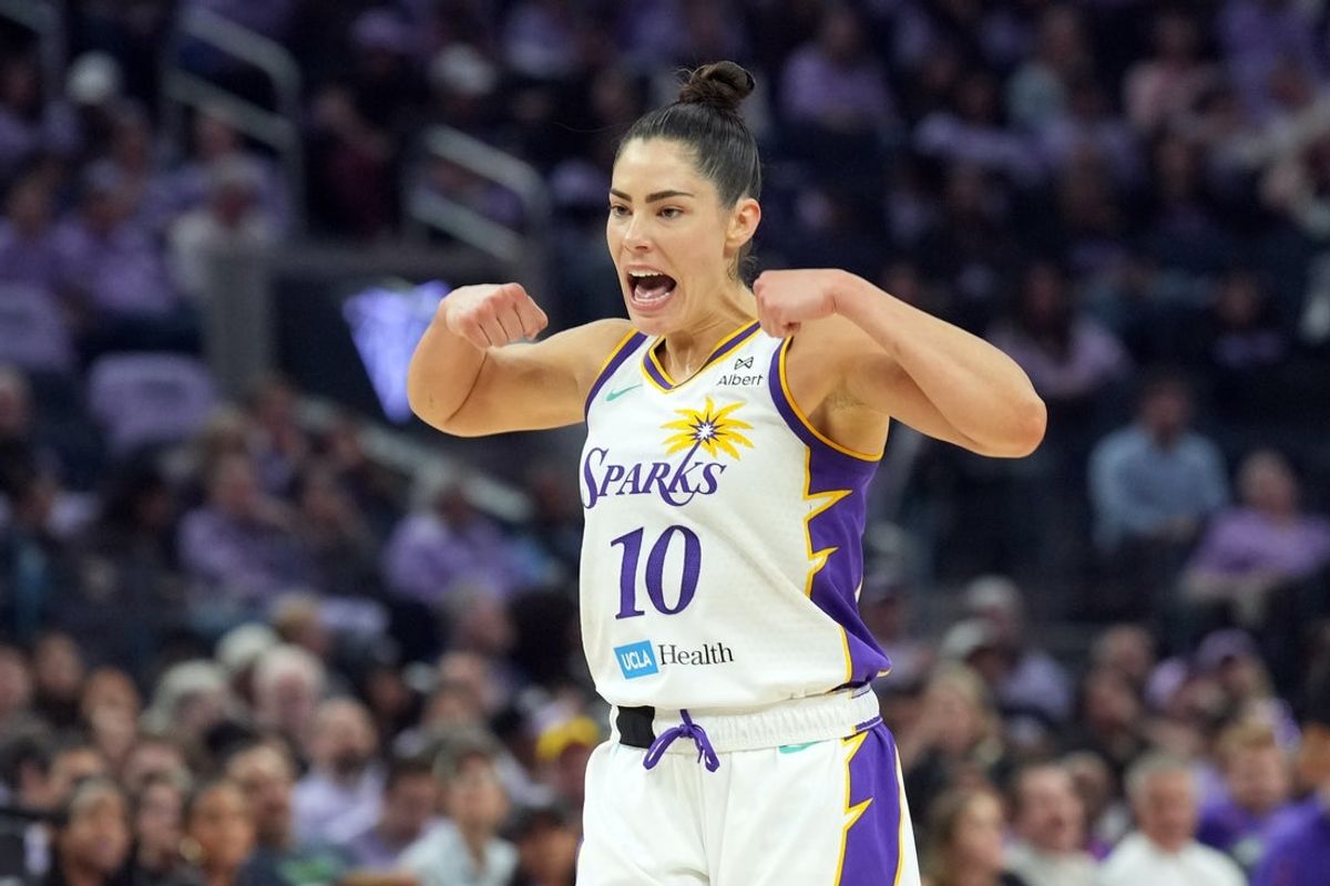 May 16, 2025; San Francisco, California, USA; Los Angeles Sparks guard Kelsey Plum (10) gestures after a basket by forward Rickea Jackson (not shown) during the second quarter against the Golden State Valkyries at Chase Center. Mandatory Credit: Darren Yamashita-Imagn Images