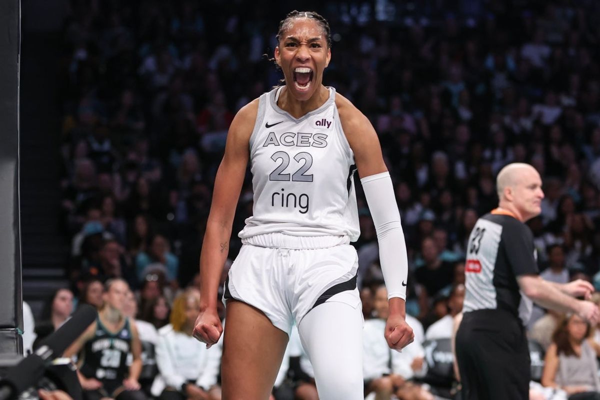 May 17, 2025; Brooklyn, New York, USA; Las Vegas Aces center A'ja Wilson (22) reacts after getting fouled after a made basket in the first quarter against the New York Liberty at Barclays Center. Mandatory Credit: Wendell Cruz-Imagn Images