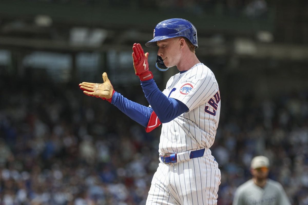 May 17, 2025; Chicago, Illinois, USA; Chicago Cubs right fielder Pete Crow-Armstrong (4) celebrates after hitting a two-run single against the Chicago White Sox during the second inning at Wrigley Field. Mandatory Credit: Kamil Krzaczynski-Imagn Images