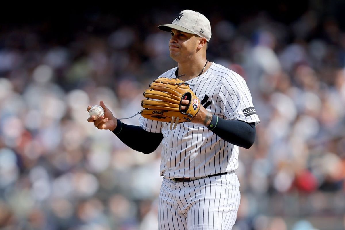 May 17, 2025; Bronx, New York, USA; New York Yankees relief pitcher Fernando Cruz (63) reacts during the ninth inning against the New York Mets at Yankee Stadium. Mandatory Credit: Brad Penner-Imagn Images