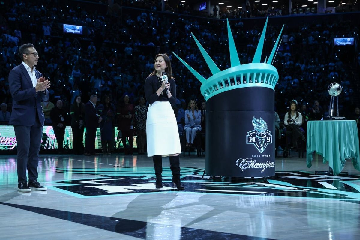 May 17, 2025; Brooklyn, New York, USA;  New York Liberty owner Clara Wu Tsai addresses the fans during the pregame ceremonies prior to the start of the game between the Las Vegas Aces and the New York Liberty at Barclays Center. Mandatory Credit: Wendell Cruz-Imagn Images