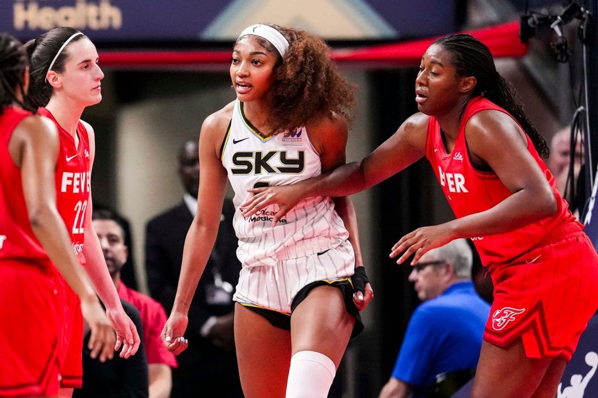 Chicago Sky forward Angel Reese (5) reacts to a flagrant foul from Indiana Fever guard Caitlin Clark (22) on Saturday, May 17, 2025, during a game between the Indiana Fever and the Chicago Sky at Gainbridge Fieldhouse in Indianapolis. The Indiana Fever defeated the Chicago Sky, 93-58.