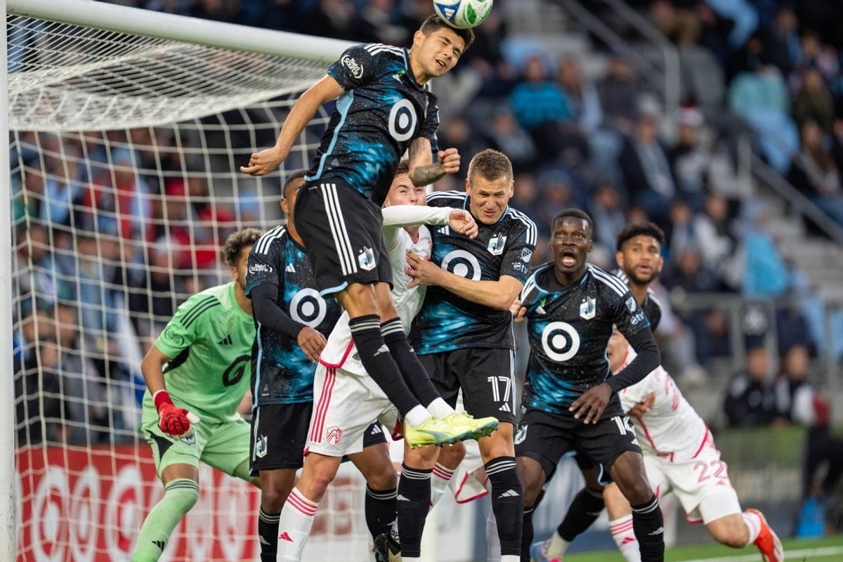 May 17, 2025; Saint Paul, Minnesota, USA; Minnesota United defender Anthony Markanich (13) heads a St. Louis City corner kick out of the way in the first half at Allianz Field. Mandatory Credit: Matt Blewett-Imagn Images