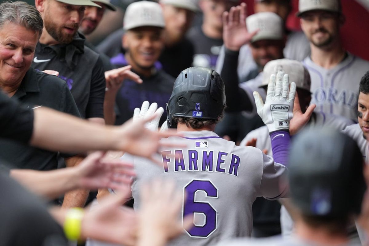 May 17, 2025; Phoenix, Arizona, USA; Colorado Rockies first baseman Kyle Farmer (6) celebrates two run home run with teammates against the Arizona Diamondbacks in the third inning at Chase Field. Mandatory Credit: Jacob Reiner-Imagn Images