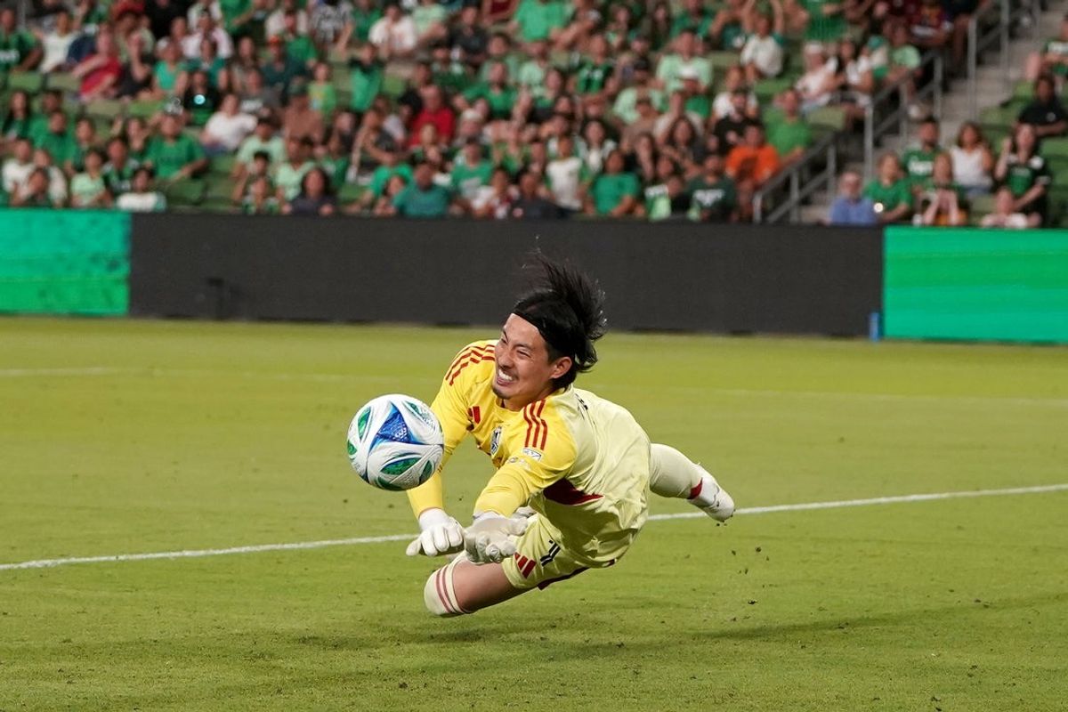 May 17, 2025; Austin, Texas, USA; Vancouver Whitecaps FC goalkeeper Yohei Takaoka (1) dives for the ball during the second half against Austin FC at Q2 Stadium. Mandatory Credit: Dustin Safranek-Imagn Images