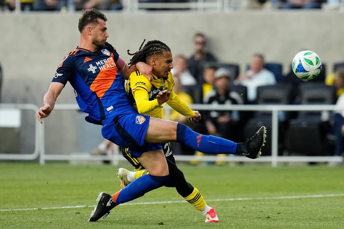 FC Cincinnati defender Matt Miazga (21) collides with Columbus Crew defender Mohamed Farsi (23) during the first half of the MLS soccer match at Lower.com Field in Columbus on May 17, 2025.