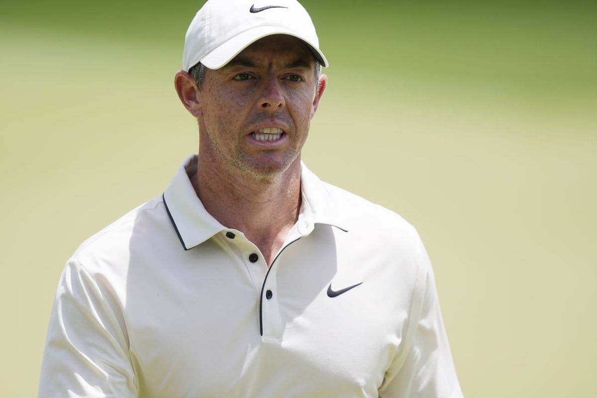 May 18, 2025; Charlotte, North Carolina, USA; Rory McIlroy walks off the 15th green during the final round of the PGA Championship golf tournament at Quail Hollow. Mandatory Credit: Jim Dedmon-Imagn Images