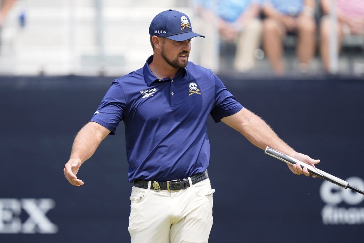 May 18, 2025; Charlotte, North Carolina, USA; Bryson DeChambeau reacts after missing a putt on the second green during the final round of the PGA Championship golf tournament at Quail Hollow. Mandatory Credit: Jim Dedmon-Imagn Images