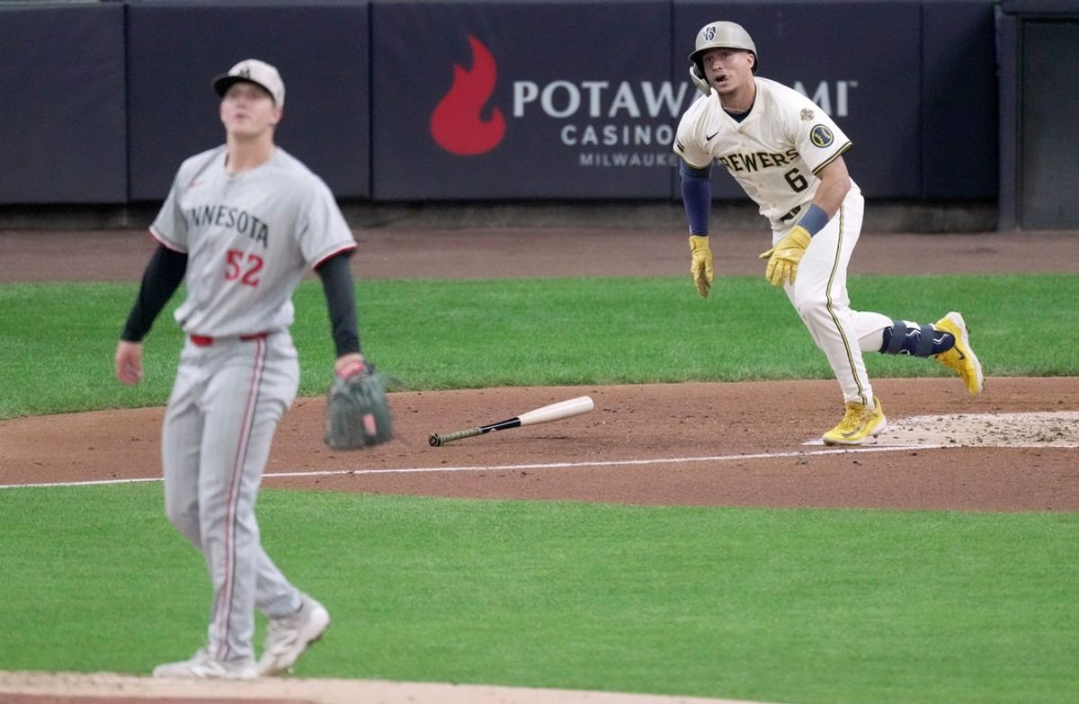 Milwaukee Brewers outfielder Isaac Collins (6) watches his two-run RBI single off of Minnesota Twins pitcher Zerby Matthews (52) during the third inning of their game Sunday, May 18, 2025 at American Family Field in Milwaukee, Wisconsin.