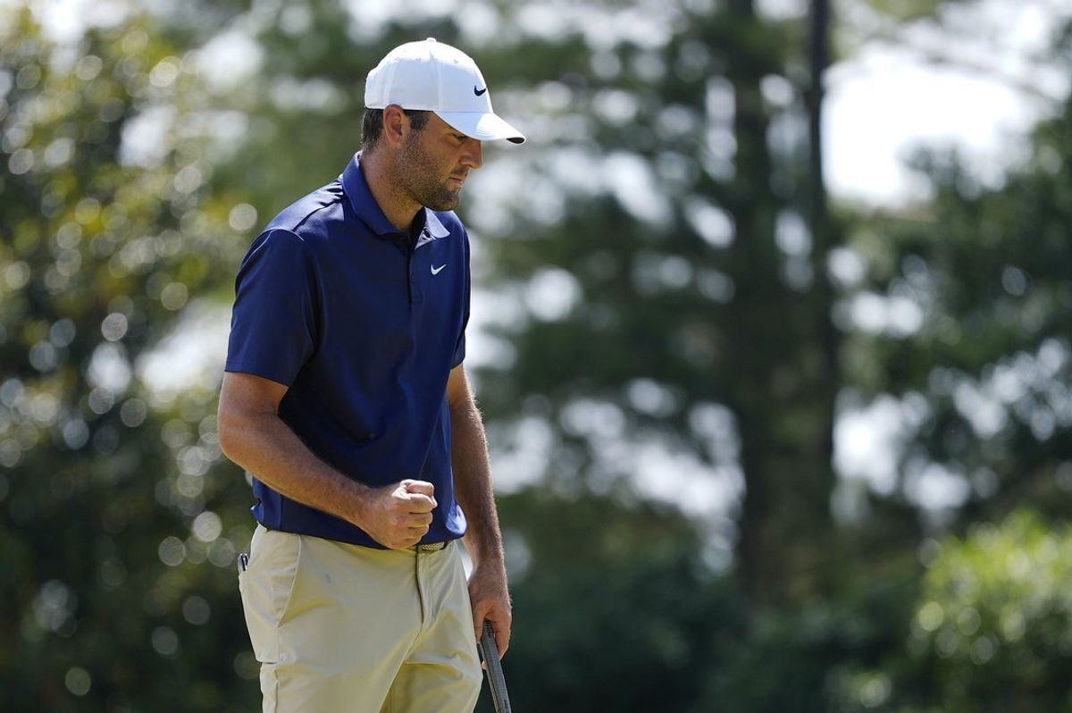 May 18, 2025; Charlotte, North Carolina, USA; Scottie Scheffler reacts after a putt fifth green during the final round of the PGA Championship golf tournament at Quail Hollow. Mandatory Credit: Jim Dedmon-Imagn Images