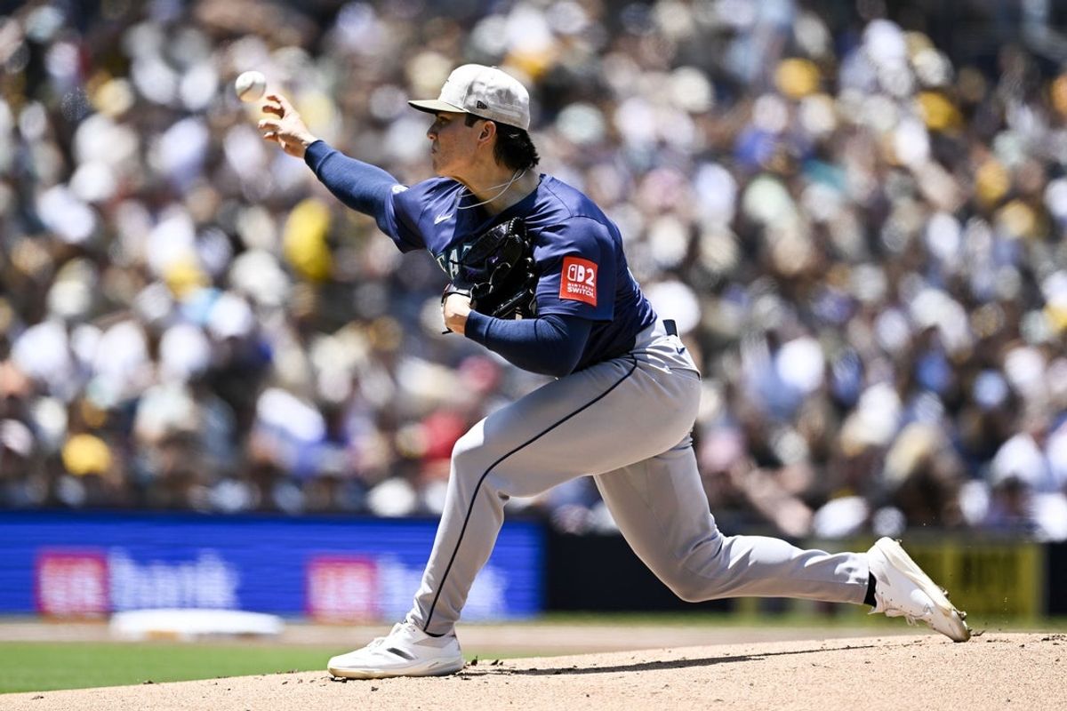 May 18, 2025; San Diego, California, USA; Seattle Mariners starting pitcher Bryan Woo (22) delivers during the first inning against the San Diego Padres at Petco Park. Mandatory Credit: Denis Poroy-Imagn Images