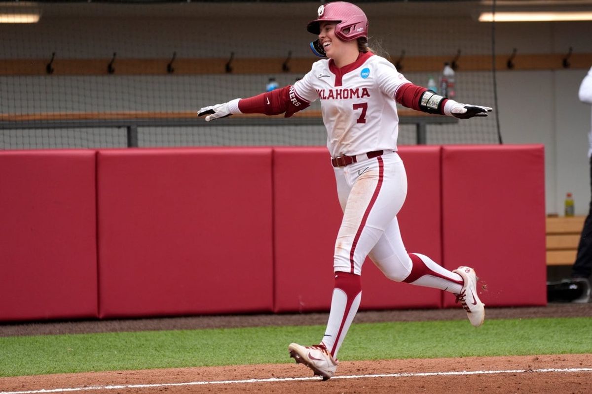 Oklahoma outfielder Kasidi Pickering (7) celebrates after hitting a three-run home run in the fourth inning of a softball game in the Norman Regional of the NCAA Tournament between the University of Oklahoma Sooners (OU) and the California Golden Bears at Love's Field in Norman, Okla., Sunday, May 18, 2025. Oklahoma won 12-1.