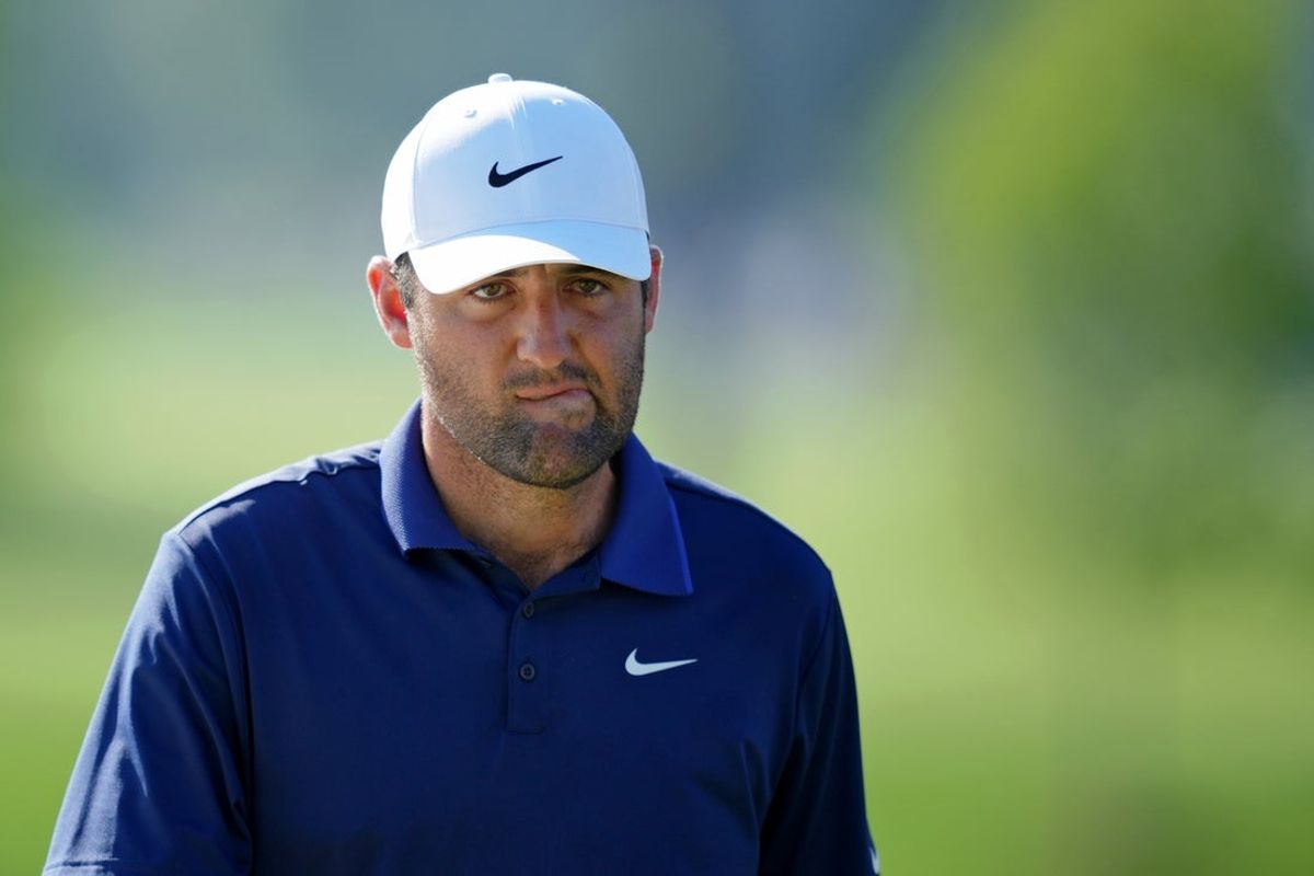 May 18, 2025; Charlotte, North Carolina, USA; Scottie Scheffler reacts after a putt on the 14th green during the final round of the PGA Championship golf tournament at Quail Hollow. Mandatory Credit: Aaron Doster-Imagn Images