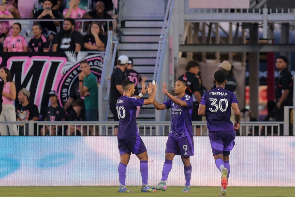 May 18, 2025; Fort Lauderdale, Florida, USA; Orlando City forward Luis Muriel (9) celebrates with midfielder Martin Ojeda (10) after scoring against Inter Miami CF during the first half at Chase Stadium. Mandatory Credit: Sam Navarro-Imagn Images
