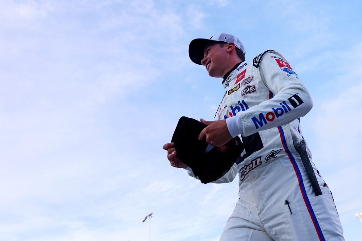 May 18, 2025; North Wilkesboro, North Carolina, USA; NASCAR Cup Series driver Christopher Bell (20) is introduced before the NASCAR All-Star Open at North Wilkesboro Speedway. Mandatory Credit: Peter Casey-Imagn Images