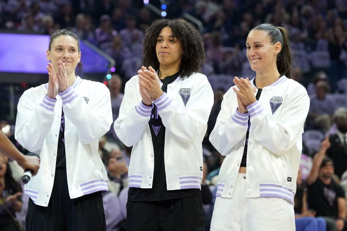 May 16, 2025; San Francisco, California, USA; Golden State Valkyries forward Cecilia Zandalasini (left) stands on the court with forwards Janelle Salaun (center) and Stephanie Talbot (right) before the game against the Los Angeles Sparks at Chase Center. Mandatory Credit: Darren Yamashita-Imagn Images