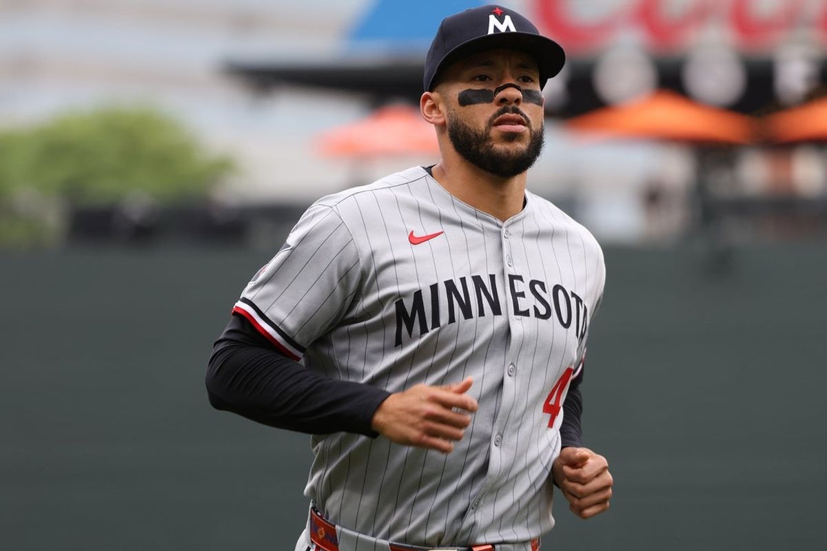 May 14, 2025; Baltimore, Maryland, USA; Minnesota Twins shortstop Carlos Correa (4) runs off of the field before a game against the Baltimore Orioles at Oriole Park at Camden Yards. Mandatory Credit: Daniel Kucin Jr.-Imagn Images