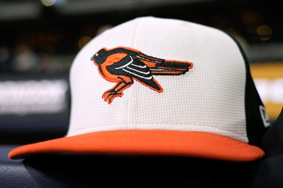 May 19, 2025; Milwaukee, Wisconsin, USA;  General view of a Baltimore Orioles cap during warmups prior to the game against the Milwaukee Brewers at American Family Field. Mandatory Credit: Jeff Hanisch-Imagn Images