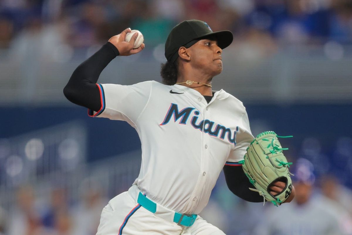 May 19, 2025; Miami, Florida, USA; Miami Marlins starting pitcher Edward Cabrera (27) delivers a pitch against the Chicago Cubs during the first inning at loanDepot Park. Mandatory Credit: Sam Navarro-Imagn Images