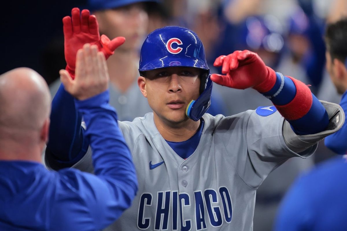 May 19, 2025; Miami, Florida, USA; Chicago Cubs catcher Miguel Amaya (9) celebrates with teammates after hitting a three-run home run against the Miami Marlins during the fourth inning at loanDepot Park. Mandatory Credit: Sam Navarro-Imagn Images