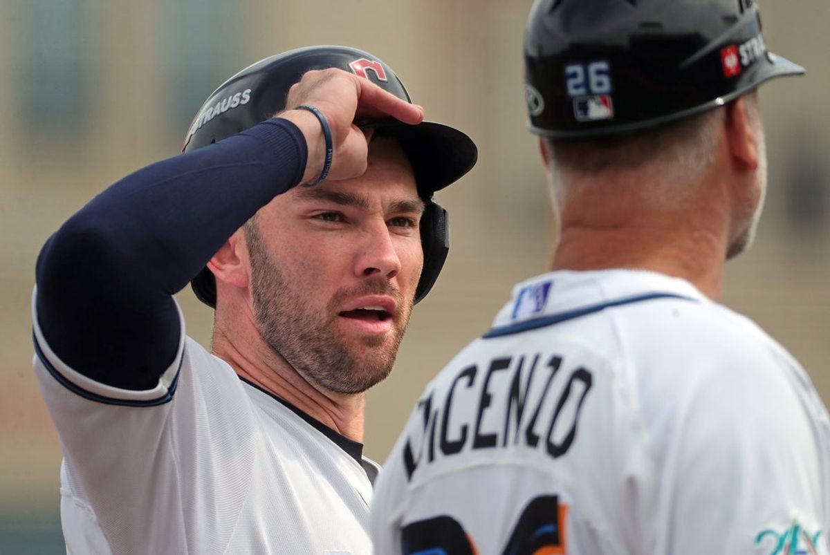 Guardians designated hitter David Fry, listens to Akron RubberDucks manager Greg DiCenzo while on rehab assignment during the third inning on Tuesday, May 20, 2025, at Canal Park.