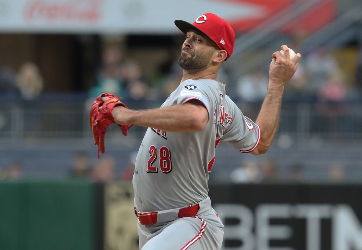 May 20, 2025; Pittsburgh, Pennsylvania, USA; Cincinnati Reds starting pitcher Nick Martinez (28) delivers a pitch against the Pittsburgh Pirates during the first inning at PNC Park. Mandatory Credit: Charles LeClaire-Imagn Images