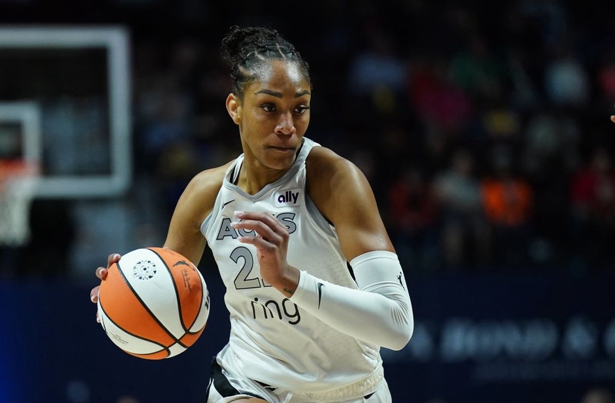 May 20, 2025; Uncasville, Connecticut, USA; Las Vegas Aces center A'ja Wilson (22) returns the ball against the Connecticut Sun in the first half at Mohegan Sun Arena. Mandatory Credit: David Butler II-Imagn Images