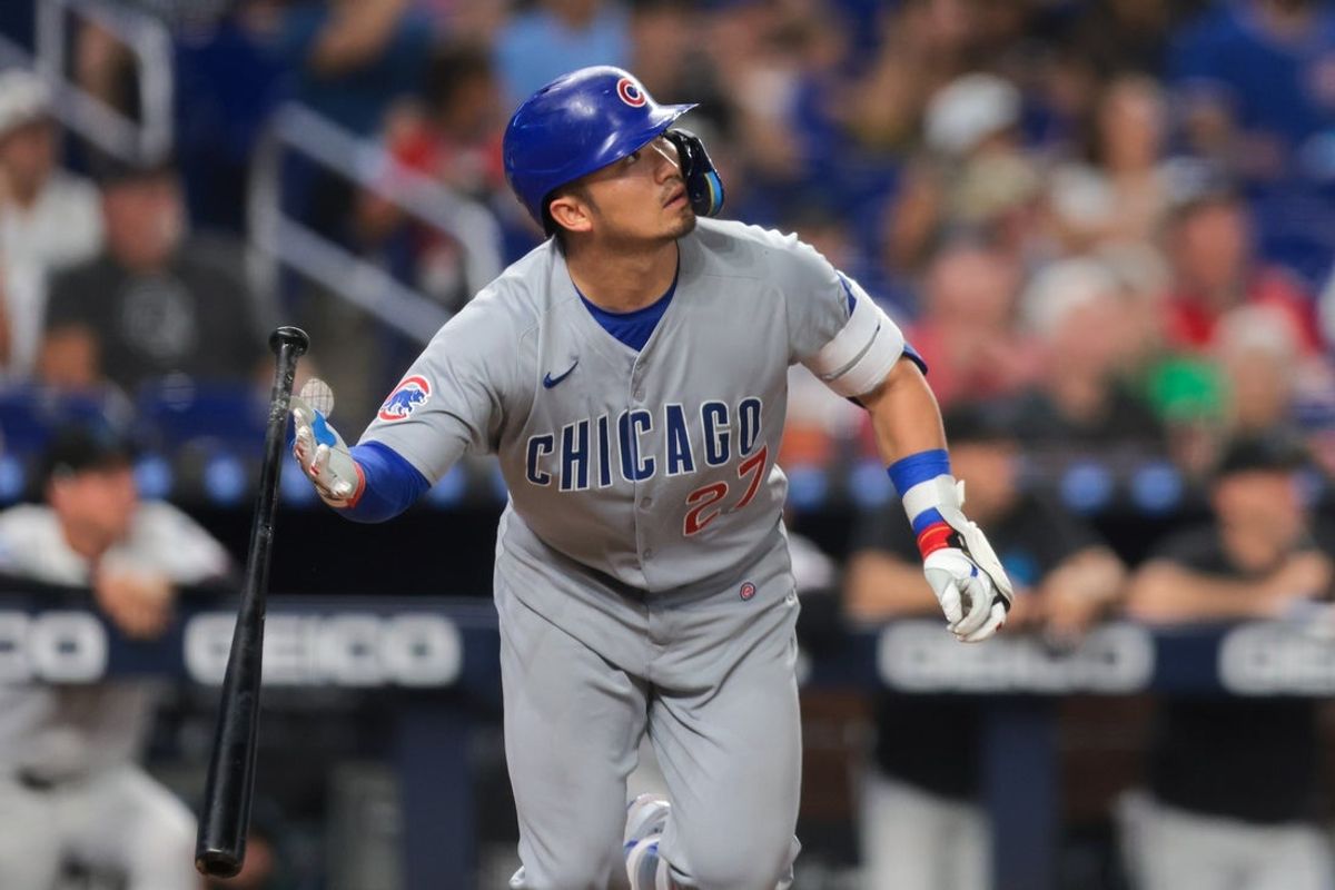 May 20, 2025; Miami, Florida, USA; Chicago Cubs right fielder Seiya Suzuki (27) hits a two-run home run against the Miami Marlins during the sixth inning at loanDepot Park. Mandatory Credit: Sam Navarro-Imagn Images