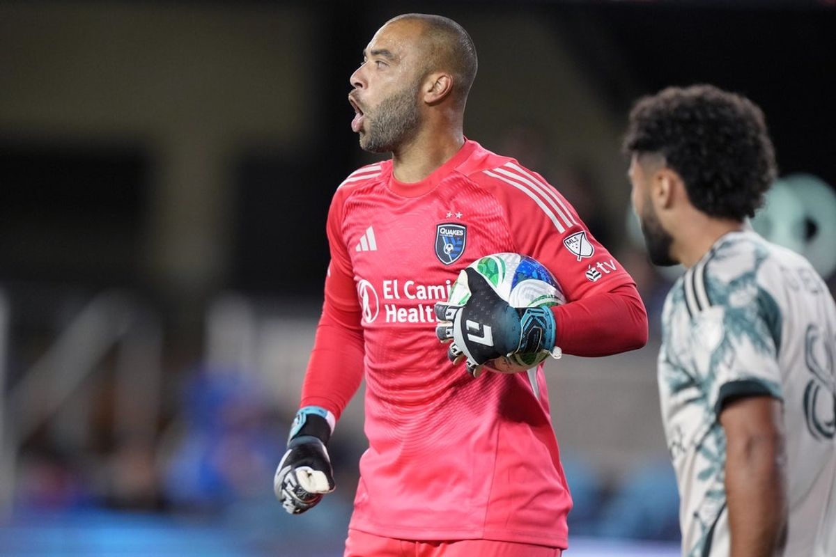 May 20, 2025; San Jose, California, USA; San Jose Earthquakes goalkeeper Earl Edwards Jr. (center) reacts after securing the ball during the second half against the Portland Timbers at PayPal Park. Mandatory Credit: Darren Yamashita-Imagn Images