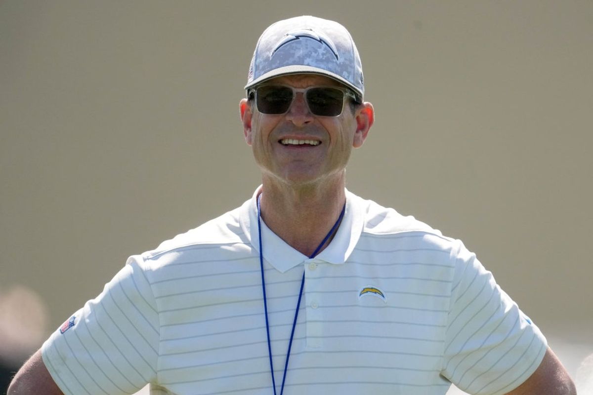 May 20, 2025; El Segundo, CA, USA; Los Angeles Chargers coach Jim Harbaugh looks on during offseason workouts at The Bolt. Mandatory Credit: Kirby Lee-Imagn Images